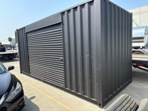 20ft Used Shipping Container – Matte Black w/ 12’ Side Roll-Up Door - Image 3